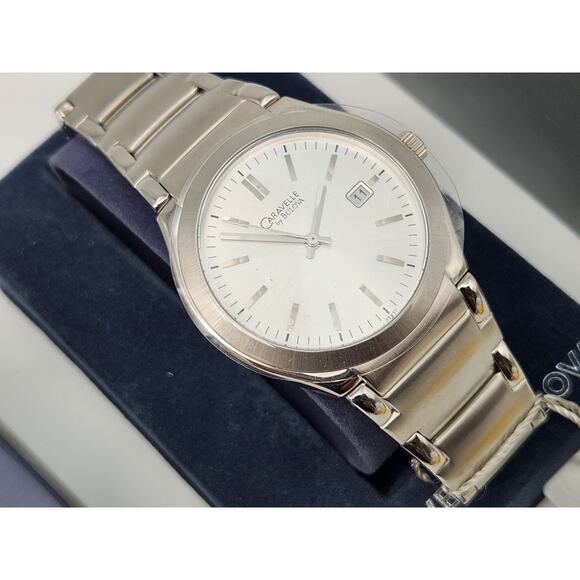 Caravelle by Bulova Men's Brushed Silver Tone Round Analog Date Watch NOS - Picture 1 of 9